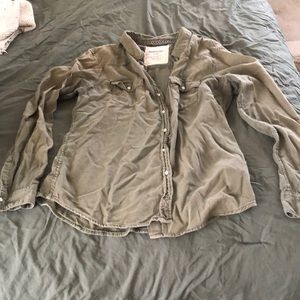 Green long sleeve with white marble buttons